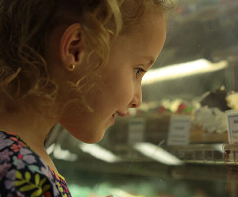 Girl looking at display